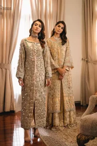 An unforgettable look and ideal for the festive season. An elegant yet trendy front open style makes this outfit more classy. Crafted artfully with detailed zardozi work and illusion neckline finessed with kora, dabka, and Kundan. The motifs and intricate details are a true example of decorative and ornamental expression stylized in a contemporary way. The bell sleeves make this outfit more classy. Balance the look with banarsi lehenga highlighted with embroidered borders at the bottom. The dupatta is enhanced with embroidered pallu.