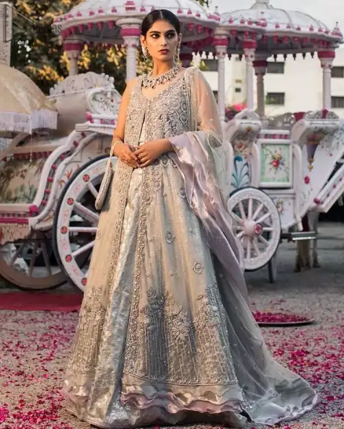 Light gray pure banarsi jamawar blouse, lehenga with front open long jacket having multiple layered frill.