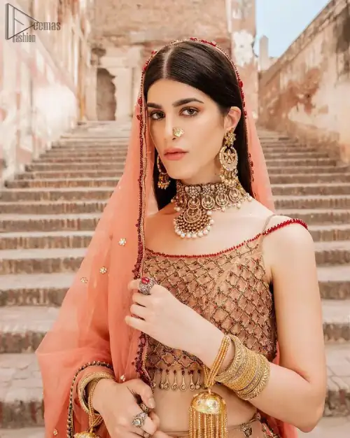 Crafted with love. This beautiful bride is a vision of impeccable grace and elegance in a divinely crafted bridal couture,