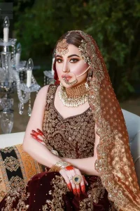 Perfect wear for all those looking for something bold yet beautiful. The Maroon Velvet Lehenga is an example of remarkable copper hand embroidery.