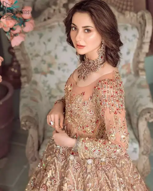 Peach Ruffled Maxi – Back Train Style Dupatta. Peach Blossoming Floral like Maxi with a frilled red border and Organza