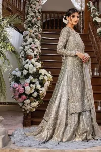 Gratifying yourself with the choice of the right dress is not always easy. But with a full-sleeved Gray Back Train Ruffled Lehenga Shirt,