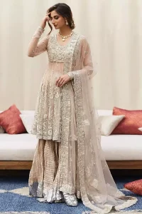 Your aesthetic evening party deserves a little extra treat with your guests admiring you in a Light Fawn Peplum Dupatta. Light Fawn Peplum Dupatta – Crushed Sharara.