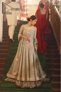 Exceptionally styled and symphonized stitching makes you gorgeous enough that it would surely make your big days remembering one. The Gray Pishwas Frock is a true beauty when it comes to the work of perfection. This Half Sleeves fit and flare attire is made to brighten up your persona with its finest adornments under its charming sweetheart neckline. It comprises gray crushed sharara and organza dupatta ornamented with a four-sided embellished border.