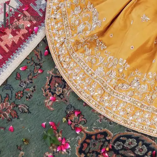 The shirt is the mirror of the mind and the dupatta confesses secrets of the heart. This mustard soft-toned article