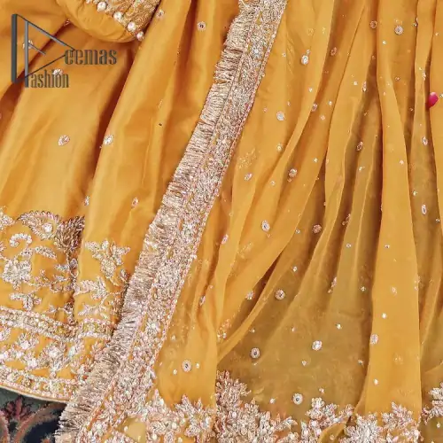 The shirt is the mirror of the mind and the dupatta confesses secrets of the heart. This mustard soft-toned article