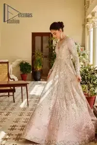 A true epitome of elegance. Confected ever so beautifully with the oyster pink colour palette and eye-catching embroidery. The ouster pink maxi is splendid just because of its multiple colour embroidery which is involved with tilla, dabka, kora and pearls. Further, it is prominent with its V shape neckline that grants pleasure to you on your walima day when combine with full sleeves. Complete this oyster pink outfit with a dupatta that is ornamented with embellished border and sequins spray just to fulfil your dream.