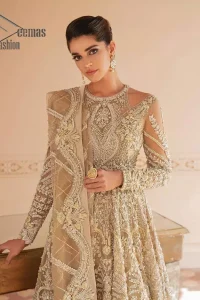 Something to Beige about! This article is specially presented by DeemasFashion featuring thoughtfully designed ensembles with a rich beige colour maxi and dupatta that are flattering on the body's quintessential details. The round neckline of the maxi is attractively combined with the back train that is heavily adorned with silver dabka, tilla,m zardozi embroidery for the finest look. In addition to this, it is paired up with the same colour dupatta that is again ornamented with \a four-sided border and sequins spray all over to fulfil your finest promising look on your walima day. 