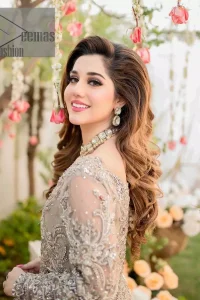 Embrace happiness on your Walima in the colour of beige-pink along this dreamiest fairy tail maxi. The floral fusion of tilla and thread embroidery on a royal beige-pink maxi is to fulfil your dreamy look. The boat shape neckline of this maxi is as amazing as the whole maxi. Further, it is fully embellished with tilla, kora, dabka and sequins work just to enhance the beauty of your Walima day. The fairy tale is also adorned with heavy work and looks super amazing when combine with full sleeves style. Finish this fairy look with the same colour dupatta that is ornamented with a four-sided border and sequins sprayed all over to increase the look of this article.