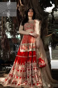 Love is just a twirl away! DeemasFashion presents a beige-pink shirt that looks super amazing when its full sleeves are combined with boat shape neckline. The outfit is embellished with dabka, kora, sequin and pearls, making it a true embodiment of finesse and elegance. Further, it is highlighted with golden embroidery that enhances the beauty of this outfit. It is coordinated with red gharara which is again prominent with embroidery to make your day lovely and remarkable. Finish this outfit with a light golden dupatta that is ornamented with a four-sided embellished border and sequins sprayed all over to increase the romance of the outfit.