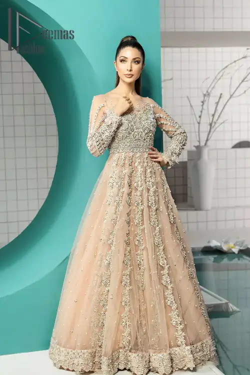 Unleashing your inner evocation of feeling about love and imagination. The Beige scalloped maxi is attractively adorned with silver embroidery