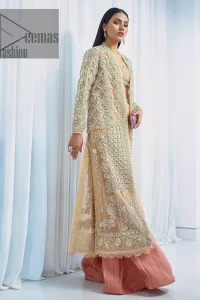 It's all about the colour you wear. Feel yourself in the fawn colour so stunning and adorable. Starting this article with a fawn blouse that is slightly embellished with silver embroidery and the V shape neckline of the blouse added super beauty to the article. It is handsomely organized with a front open long shirt which is prominent with silver embroidery that contains tilla, kora, dabka and crystals. The full sleeves of the long shirt raise the feeling of pleasure in any event. Complete this article with crushed sharara that is highlighted with two-tone colours.