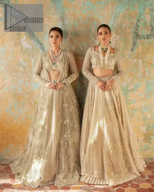 With a touch of Divine. A stunning ivory blouse is laboriously frosted with meticulously detailed hand embellishment with kora, dabka,