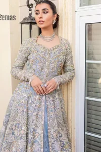 Something to blue about!. Trust on DeemasFashion to bring the magic of light blue colour for you on your walima day. Starting this outfit with a light blue front open maxi which is appealing with silver embroidery. The embroidery is further prominent with tilla, kora, zardozi and pearls work to raise the loveliness of the outfit. It is paired up with a full frilled lehenga that is designed just to express the feelings of a dreamy fairy on your Walima day. Complete this light blue outfit with the same colour scallop[ed dupatta that is adorned with a four-sided embellished border and sequins spray all over. 