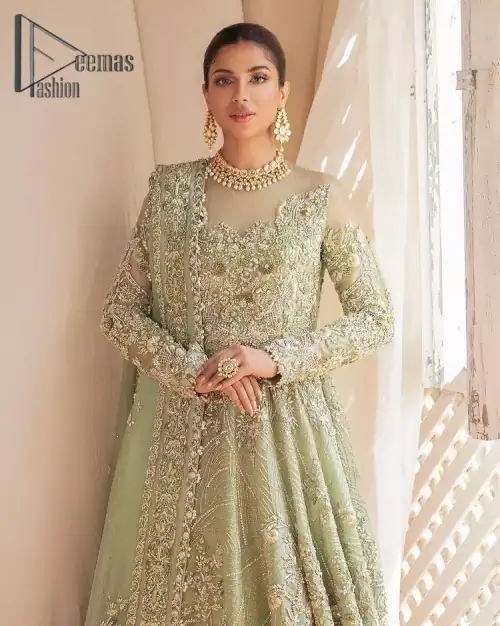 A time of life that is not just an occasion but a celebration. A pastel green scalloped maxi laboriously frosted