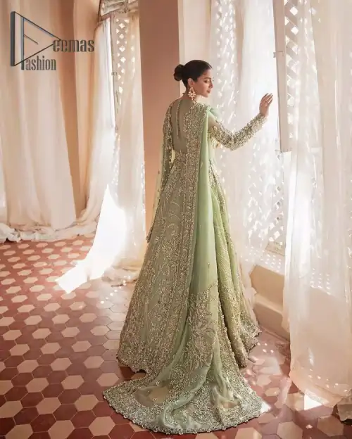 A time of life that is not just an occasion but a celebration. A pastel green scalloped maxi laboriously frosted