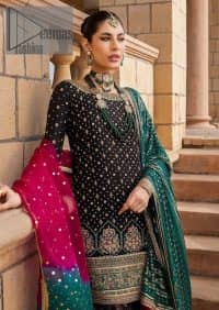 The perfect combination of crazy black with ever so classic green. Stunningly embrace you with a black shirt which is beautifully decorated with golden embroidery so you can wear it at any night and day dazzling event. It involves kora, dabka and Kundan work to escalate the beauty of the outfit. Further, the boat shape neckline amplifies the point of view when together with full sleeves. It is coordinated with black gharara that is enhanced with floral motifs all over. Finish this article with a green dupatta that is adorned with sequins sprayed all over. You can also carry a chaddar of green colour with this outfit.