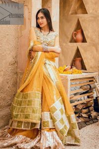 Mustard is just associated and boosts your Mehandi.  Presenting a dreamy mustard frock with a heavily embroidered bodice on a silver base. The bodice is further enhanced with handwork that includes crystal, tilla, kora and dabka work. Furthermore, the boat shape neckline and tiny work on full sleeves have the super style just to boost your day. The bottom is decorated with artistic embroidery that is adding glam to it. The Mehandi look is completed with an artistically crafted frilled lehenga which frill borders displaying the traditional hint of charm. It is coordinated with a dupatta in the same colour that is embellished with four-sided borders as well. 