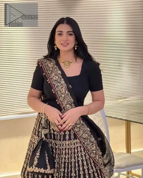 Black is the second way to show romanticness. This black article is attractively rendered with golden embroidery in which details