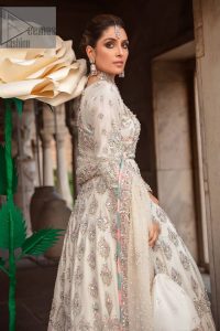 Ivory is effortlessly snappy and fun with the essence of pop. Introducing the Walima outfit for the happiest bride. Starting the outfit with an astonishing blouse having golden embroidery which includes kora, dabka, tilla and Kundan to make this outfit a unique piece of fun. Further, it is enhanced with boat shape neckline with intimate full sleeves. It is beautifully organized with a can-can lehenga in the same colour to embrace the magic of love. The floral embroidery on the lehenga gives a super aesthetic feeling to the outfit. Finish this look with the handsome dupatta in the same hue having a four-sided embellished border and sequins sprayed all over to show the essence of pop.