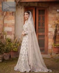 Ivory is effortlessly snappy and fun with the essence of pop. Introducing the Walima outfit for the happiest bride. Starting the outfit with an astonishing blouse having golden embroidery which includes kora, dabka, tilla and Kundan to make this outfit a unique piece of fun. Further, it is enhanced with boat shape neckline with intimate full sleeves. It is beautifully organized with a can-can lehenga in the same colour to embrace the magic of love. The floral embroidery on the lehenga gives a super aesthetic feeling to the outfit. Finish this look with the handsome dupatta in the same hue having a four-sided embellished border and sequins sprayed all over to show the essence of pop.