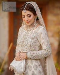 Ivory is effortlessly snappy and fun with the essence of pop. Introducing the Walima outfit for the happiest bride. Starting the outfit with an astonishing blouse having golden embroidery which includes kora, dabka, tilla and Kundan to make this outfit a unique piece of fun. Further, it is enhanced with boat shape neckline with intimate full sleeves. It is beautifully organized with a can-can lehenga in the same colour to embrace the magic of love. The floral embroidery on the lehenga gives a super aesthetic feeling to the outfit. Finish this look with the handsome dupatta in the same hue having a four-sided embellished border and sequins sprayed all over to show the essence of pop.