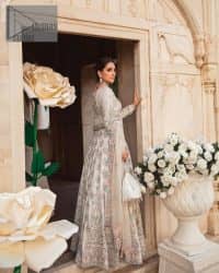 Ivory is effortlessly snappy and fun with the essence of pop. Introducing the Walima outfit for the happiest bride. Starting the outfit with an astonishing blouse having golden embroidery which includes kora, dabka, tilla and Kundan to make this outfit a unique piece of fun. Further, it is enhanced with boat shape neckline with intimate full sleeves. It is beautifully organized with a can-can lehenga in the same colour to embrace the magic of love. The floral embroidery on the lehenga gives a super aesthetic feeling to the outfit. Finish this look with the handsome dupatta in the same hue having a four-sided embellished border and sequins sprayed all over to show the essence of pop.