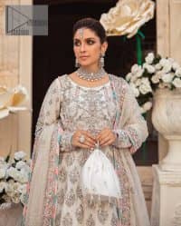 Ivory is effortlessly snappy and fun with the essence of pop. Introducing the Walima outfit for the happiest bride. Starting the outfit with an astonishing blouse having golden embroidery which includes kora, dabka, tilla and Kundan to make this outfit a unique piece of fun. Further, it is enhanced with boat shape neckline with intimate full sleeves. It is beautifully organized with a can-can lehenga in the same colour to embrace the magic of love. The floral embroidery on the lehenga gives a super aesthetic feeling to the outfit. Finish this look with the handsome dupatta in the same hue having a four-sided embellished border and sequins sprayed all over to show the essence of pop.