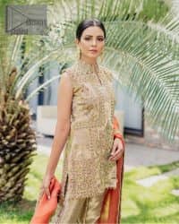 Envelop yourself into a dazzling love affair. The unique article in ivory colour just highlighted you at any event. The short shirt of the article is handsomely decorated with golden embroidery which includes kora, dabka, tilla, Kundan and Sitara work to make your event blazing and dazzling.  It is enhanced with a collared neckline to make this outfit more formal when come with a sleeveless style. Further, it is coordinated with pant which is embellished with golden embroidery. Last but not least piece the dupatta comes in rust colour having four-sided embellished borders to encapsulate you in stars.