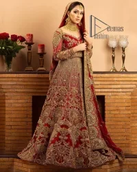 Most girls are excited just to wear maroon amazements. DeemasFashion initiates this Pakistani reception wear which includes a maroon blouse which is meticulously hand rendered with antique embroidery that enhances tilla, dabka, kora and zardozi. Further, the sweetheart neckline of the blouse splendidly comes with full sleeves. The Pakistani reception wear is organized with a flared lehenga which is heavily embellished. Conclude this Pakistani reception wear with a dupatta in the same colour which is adorned with four-sided borders to meet your amazements.
