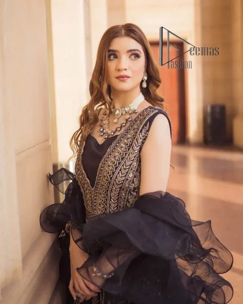 Wear black in-depth to lead colourful lives. DeemasFashion presents black party wear which includes a front open maxi having light