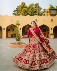 There is a shade of deep red for every bride. This Pakistani reception article begins with a deep red blouse which is simple but handsome and attractive. The blouse has boat shape neckline and full sleeves. The border of the sleeves is beautifully embellished with light golden embroidery. Furthermore, the Pakistani reception article also includes a fit and flare lehenga having heavy embroidery in light golden colour to make your day more romantic. Complete this Pakistani reception article with a deep red dupatta which is adorned with a four-sided border to give you a flavour shade of a Pakistani bride.
