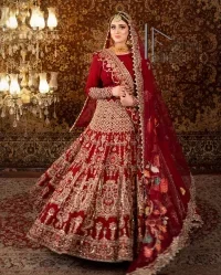 There is a shade of deep red for every bride. This Pakistani reception article begins with a deep red blouse which is simple but handsome and attractive. The blouse has boat shape neckline and full sleeves. The border of the sleeves is beautifully embellished with light golden embroidery. Furthermore, the Pakistani reception article also includes a fit and flare lehenga having heavy embroidery in light golden colour to make your day more romantic. Complete this Pakistani reception article with a deep red dupatta which is adorned with a four-sided border to give you a flavour shade of a Pakistani bride.