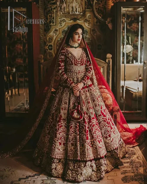 Deep red on Big day is just associated with love and romance. The deep red panelled frock is beautifully decorated