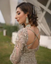 Start your new life by wearing DeemasFashion. Make your moment more memorable with light fawn heavy maxi nikah wear which is laboriously hand-rendered with silver and the same colour embroidery that enhances tilla, dabka, kora and crystal. The boat shape neckline and full sleeves of this maxi also add memorable beauty to your Qabool Hai moment. The maxi of this nikah wear is systemized with a dupatta in the same colour which is ornamented with four-sided borders and sequins sprayed all over to enhance the attractiveness of the nikah wear.