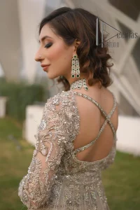 Start your new life by wearing DeemasFashion. Make your moment more memorable with light fawn heavy maxi nikah wear which is laboriously hand-rendered with silver and the same colour embroidery that enhances tilla, dabka, kora and crystal. The boat shape neckline and full sleeves of this maxi also add memorable beauty to your Qabool Hai moment. The maxi of this nikah wear is systemized with a dupatta in the same colour which is ornamented with four-sided borders and sequins sprayed all over to enhance the attractiveness of the nikah wear.