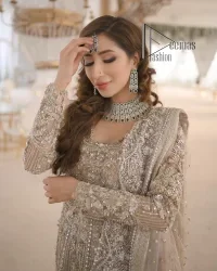 Start your new life by wearing DeemasFashion. Make your moment more memorable with light fawn heavy maxi nikah wear which is laboriously hand-rendered with silver and the same colour embroidery that enhances tilla, dabka, kora and crystal. The boat shape neckline and full sleeves of this maxi also add memorable beauty to your Qabool Hai moment. The maxi of this nikah wear is systemized with a dupatta in the same colour which is ornamented with four-sided borders and sequins sprayed all over to enhance the attractiveness of the nikah wear.