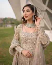 Start your new life by wearing DeemasFashion. Make your moment more memorable with light fawn heavy maxi nikah wear which is laboriously hand-rendered with silver and the same colour embroidery that enhances tilla, dabka, kora and crystal. The boat shape neckline and full sleeves of this maxi also add memorable beauty to your Qabool Hai moment. The maxi of this nikah wear is systemized with a dupatta in the same colour which is ornamented with four-sided borders and sequins sprayed all over to enhance the attractiveness of the nikah wear.