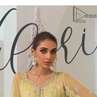 The love we share will make her mehndi day super duper amazing. This mehndi wears an olive front open shirt which is laboriously hand-rendered with a silver embroidery involving tilla, dabka, kora and Sitara. Further, the sweetheart shape neckline fulfils the dreamy look of the bride when comes with cape sleeves. The following shirt of mehndi wear is systemized with crushed sharara which is so simple and unique. Finishing this mehndi wear with a pleated dupatta that is maintaining a balance between outfits.