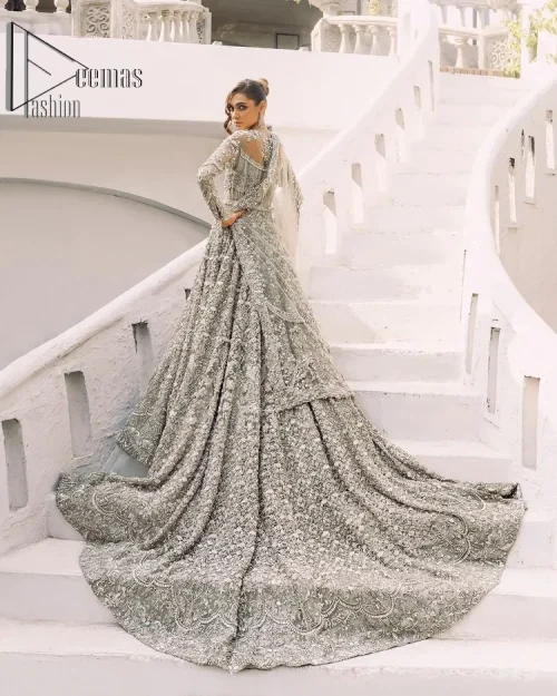 It was love at first swipe! Presenting this olive green back train maxi which is laboriously hand-rendered with silver and