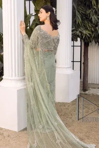 You go girl. Get you a handsome outfit that will wear matching robes. DeemasFashion presents this pistachio green saree to make you memorable in any event. It begins with a pistachio green blouse which is heavily ornamented with silver embroidery that magnifies tilla, dabka, kora and Zardozi. Further, the full sleeve style also enhances the beauty of the bridesmaid outfit when comes with boat shape neckline. Paired this blouse with a handsome and laborious saree whose scalloped border is embellished with a four-sided border and sequins spray all over to match your vibe.