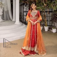 There is a shade of red in every mehndi wear. So, DeemasFashion presents this mehndi wear in the red shade which is handsomely ornamented with light golden embroidery and enhanced with tilla, dabka, kora and Zardozi. The square neckline adds more beauty to the outfit when comes with three-quarter sleeves. It is exquisitely combined with a red lehenga to make your mehndi more remarkable. Finish this mehndi wear with a dupatta in the rust colour which border is embellished with a four-sided Kiran and sequins spray all over to put amazing shade on your Mehndi.