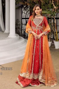 There is a shade of red in every mehndi wear. So, DeemasFashion presents this mehndi wear in the red shade which is handsomely ornamented with light golden embroidery and enhanced with tilla, dabka, kora and Zardozi. The square neckline adds more beauty to the outfit when comes with three-quarter sleeves. It is exquisitely combined with a red lehenga to make your mehndi more remarkable. Finish this mehndi wear with a dupatta in the rust colour which border is embellished with a four-sided Kiran and sequins spray all over to put amazing shade on your Mehndi.