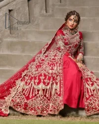 Marry someone who makes your heart shine. Wear what makes your soul shine. Introducing this Pakistani reception outfit which begins with a red blouse which is laboriously hand-rendered with silver embroidery to make your day super bright as silver colour. Further, it is highlighted with tilla, dabka, kora and crystal. The blouse of this Pakistani reception outfit is enhanced with boat shape neckline and three-quarter sleeves. The following blouse of the Pakistani reception outfit is systemized with a panelled lehenga in the same colour which is again heavily embellished. Complete this outfit with a frilled dupatta which is embellished with two-sided borders and sequins sprayed all over to make you shine.