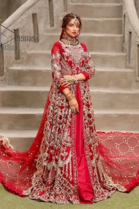 Marry someone who makes your heart shine. Wear what makes your soul shine. Introducing this Pakistani reception outfit which begins with a red blouse which is laboriously hand-rendered with silver embroidery to make your day super bright as silver colour. Further, it is highlighted with tilla, dabka, kora and crystal. The blouse of this Pakistani reception outfit is enhanced with boat shape neckline and three-quarter sleeves. The following blouse of the Pakistani reception outfit is systemized with a panelled lehenga in the same colour which is again heavily embellished. Complete this outfit with a frilled dupatta which is embellished with two-sided borders and sequins sprayed all over to make you shine.