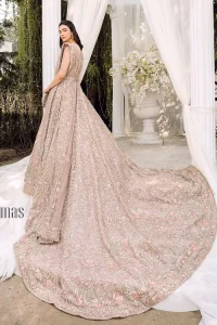 Boost your day with all about rose pink! Presenting the rose pink walima wear which begins with a heavy maxi that is beautifully hand-rendered with silver embroidery. It is attractively highlighted with tilla, dabka, kora and zardozi. The astonishing sleeveless style of the maxi looks super amazing when comes with a sweetheart neckline to make your day booster day. Furthermore, the back train of the maxi is also heavily ornamented. The walima wear is exquisitely paired up with a dupatta in the same colour which is embellished with four-sided borders and sequins sprayed all over.