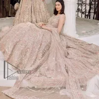 Boost your day with all about rose pink! Presenting the rose pink walima wear which begins with a heavy maxi that is beautifully hand-rendered with silver embroidery. It is attractively highlighted with tilla, dabka, kora and zardozi. The astonishing sleeveless style of the maxi looks super amazing when comes with a sweetheart neckline to make your day booster day. Furthermore, the back train of the maxi is also heavily ornamented. The walima wear is exquisitely paired up with a dupatta in the same colour which is embellished with four-sided borders and sequins sprayed all over.