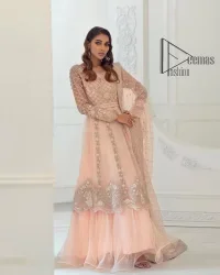 Every girl has a favourite deal with rose pink So DeemasFashion initiate this nikah wear in rose pink colour to embrace the love of brides. Starting this nikah wear with a pishwas which is beautifully styled with a double layer. The first layer is handsomely embellished with silver embroidery that includes tilla, kora, dabka and crystal. The other layer is beautifully styled with frill. Complete this nikah wear with a dupatta in the same colour adorned with a four-sided embellished border and sequins sprayed all over to make your nikah more memorable.