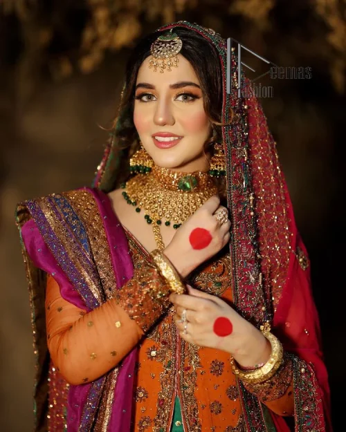 A colourful mehndi outfit is a power which directly influences the soul. Begin this mehndi outfit with a rusted front