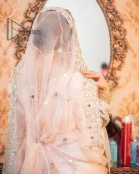 Confidence is wearing white on the big day. DeemasFashion presents the handsome and most attractive nikah outfit in white colour. Begin this nikah outfit with flared maxi which is beautifully decorated with light golden and silver embroidery involving kora, dabka, tilla and crystal to make your nikkah outfit super amazing. The round neckline of the nikah outfit laboriously comes with full sleeves. It is paired up with a dupatta in the same colour having a four-sided embellished border and sequin sprayed all over to increase your confidence with this nikah outfit.